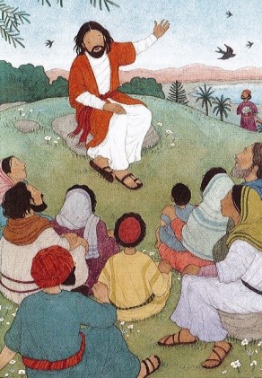 Picture from a children's Bible of Jesus, wearing a white robe, red over-tunic, and sandals, sitting on the top of a hill, speaking to a group of men, women and children, all in first-century Palestinian garb.