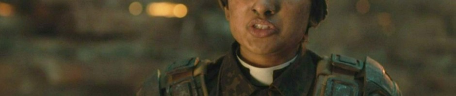 Image of Varada Sethu as a soldier with a clerical collar.