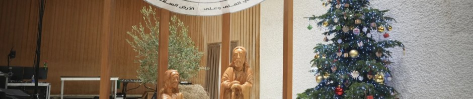 A view of the Nativity Scene crafted in Bethlehem, in the West Bank, with baby Jesus' crib covered by a keffiyeh donated by delegates of the Palestinian Embassy to the Holy See, in the Pope Paul VI Hall in the Vatican.
